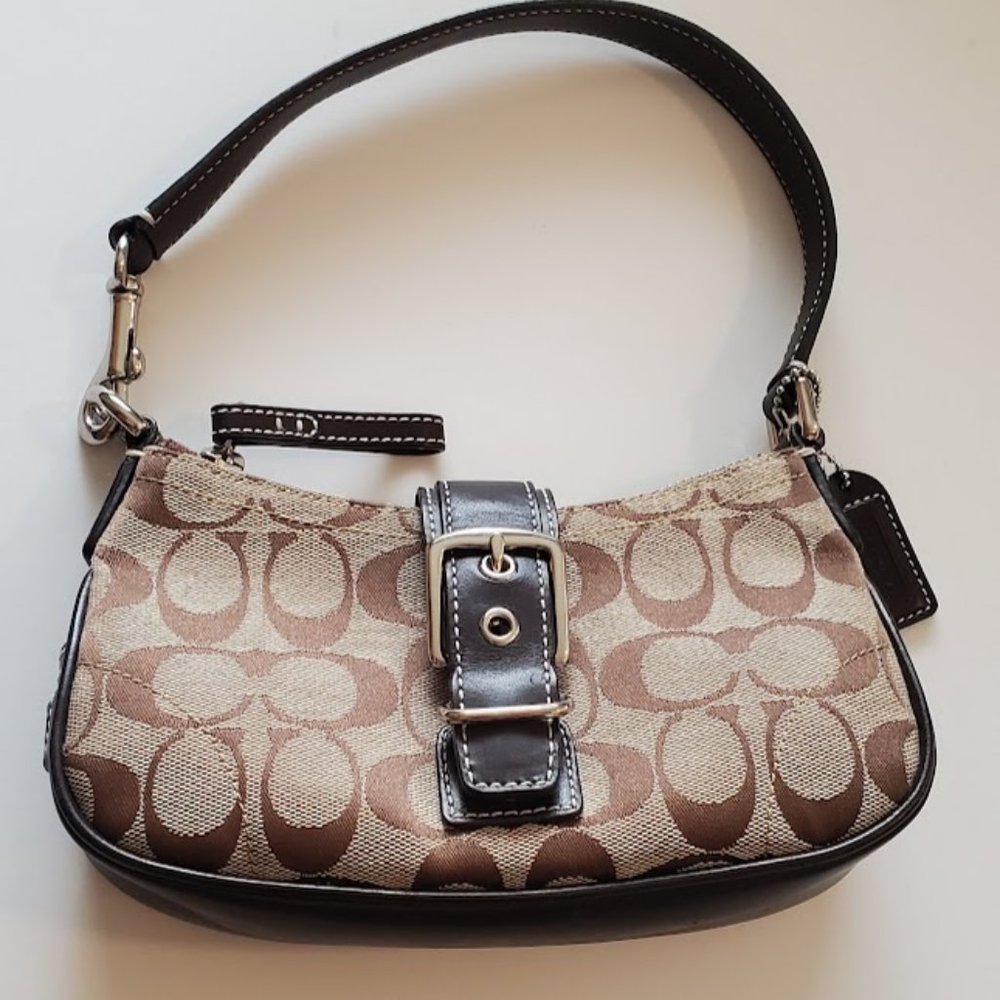 Coach Signiture Canvas mini bag with secure magnetic buckle